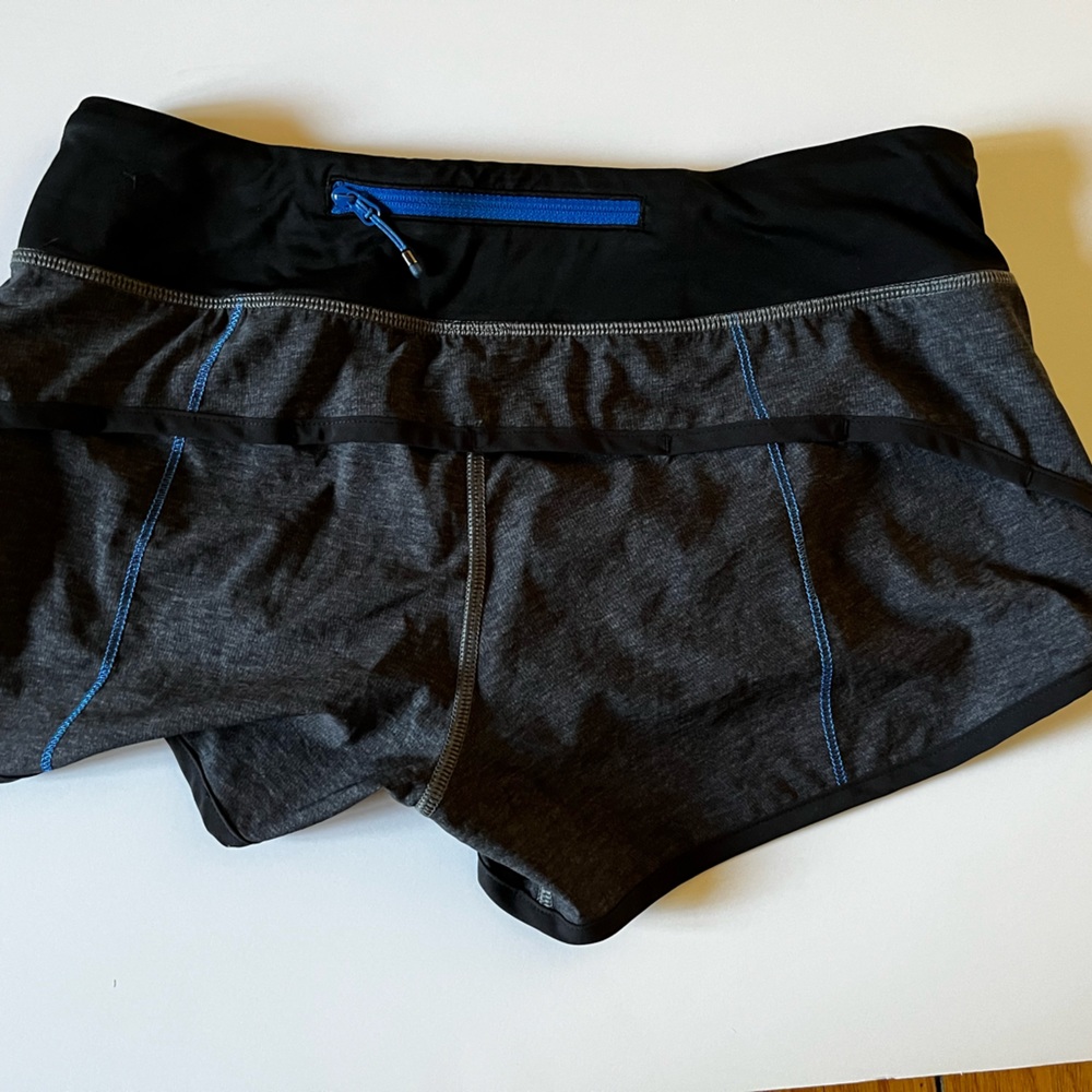 Lululemon speed shorts blackish/gray with blue stitching. EUC!